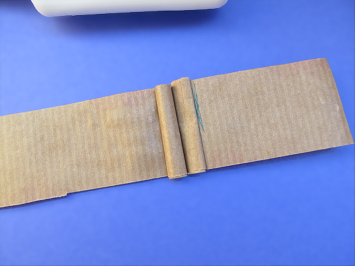 <p> Align and glue another roll next to the first and then flatten it.</p> 
<p>  </p>