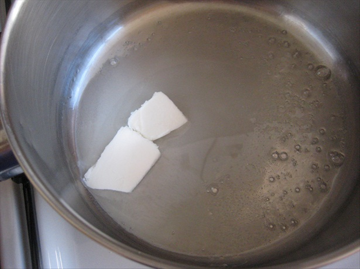 Melt the margarine or butter in a pot.