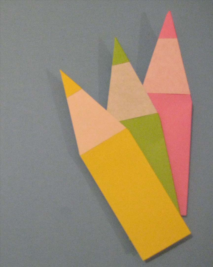 Materials:
Rectangular paper with one side colored
