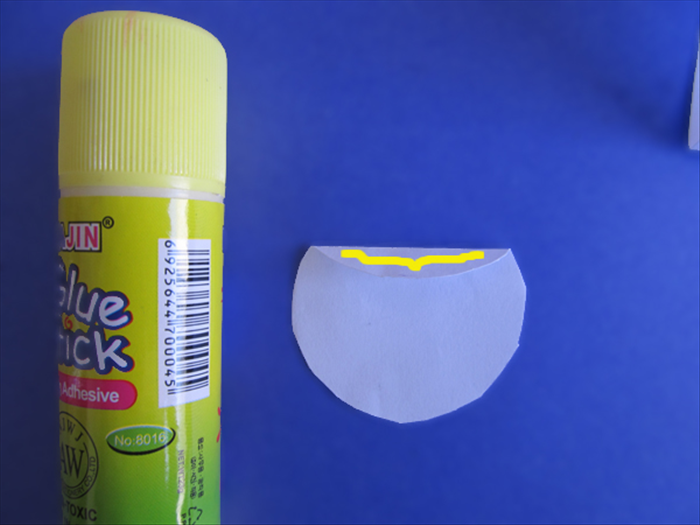 <p> Put glue on the folded part of the circle.</p> 
<p>  </p>