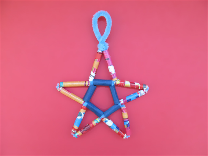 Materials:
15 paper beads  
Pipe cleaners
Scissors
