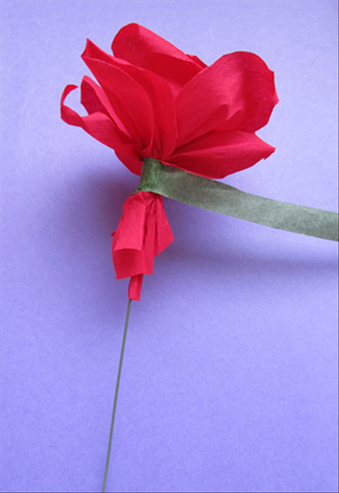 Wrap the floral tape tightly at the base of the flower.