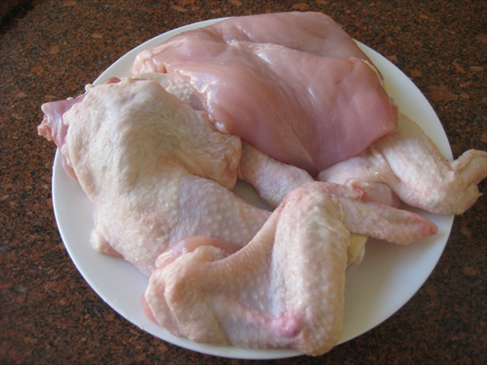 Wash off the chicken parts, remove any stickers  
and the chicken pieces are ready for cooking
