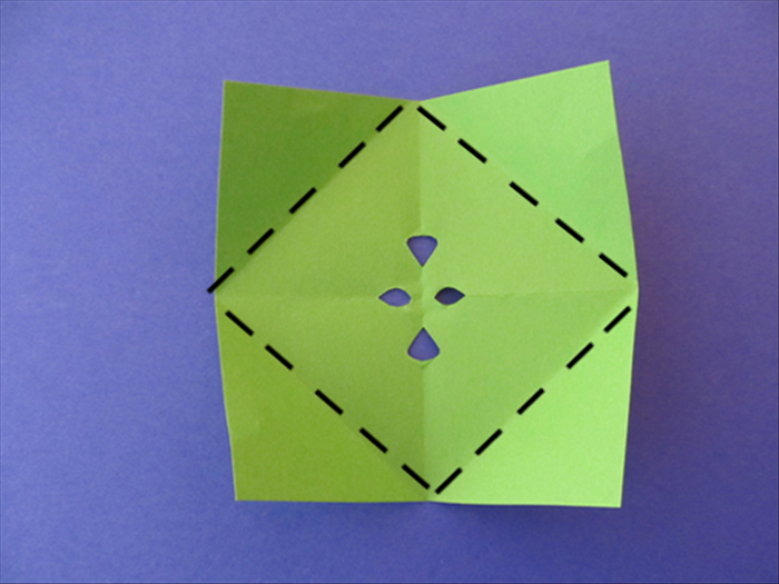 Unfold and you will see the result from the cuts.

Fold the corner points to the center.