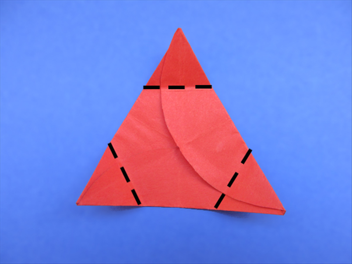 <p> Fold the 3 points of the triangle to the center point to create a hexagon.</p> 
<p>  </p>