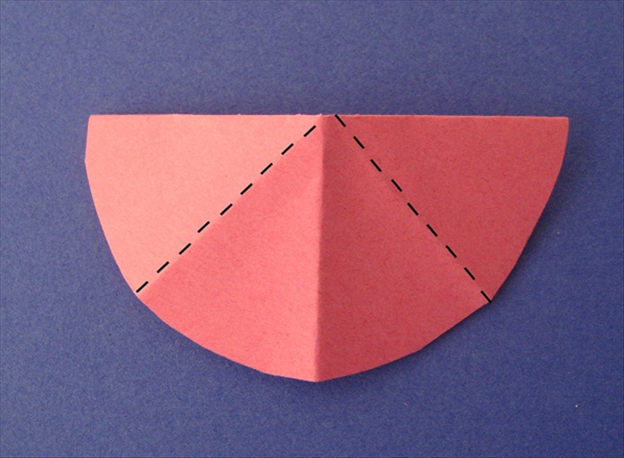Fold the straight edges on top down to the center crease