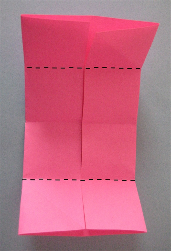 Fold the top and bottom edges to the center crease you just made.
Unfold
