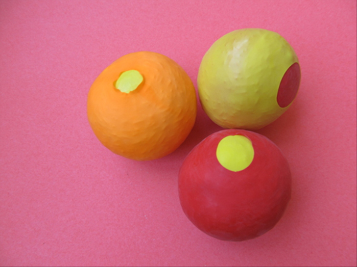 Materials for each ball:
2 small round balloons
½ cup of rice, sand or other small grains
1 sandwich bag
Scissors
