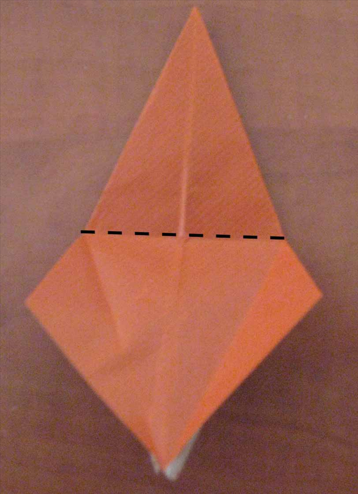 Open the 2 bottom flaps
  and fold upward along the halfway crease you just made
