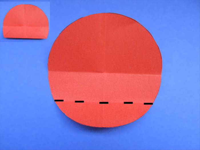 <p> Fold the bottom of the vertical crease up to the center point.</p> 
<p>  </p>