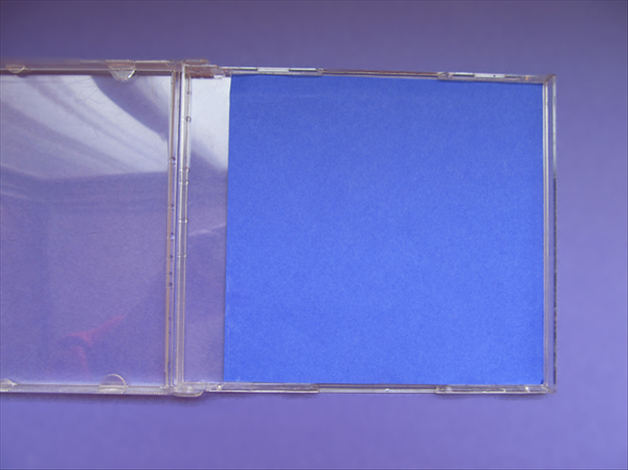 Check if the cut square fits nicely into the CD case.
This will be the background paper for the game.