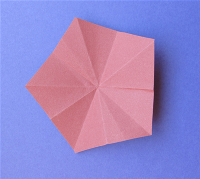 Unfold the paper to see your pentagon.