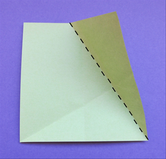 Make a fold from the right bottom corner to the top center.