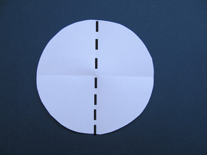 Fold the circle in half - side to side
Unfold
