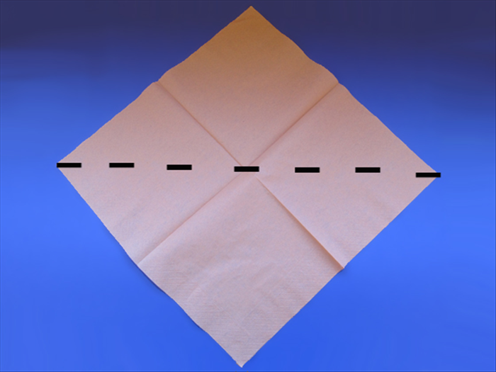 <p> Unfold the napkin</p> 
<p> Place it on the table with the points at the top, bottom and sides.</p>  
<p> Fold the bottom point up to the top point.</p>  
<p>  </p>