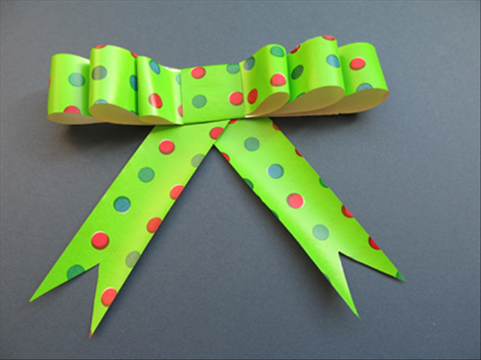 Materials:
 Wrapping paper or scrap paper 
Scissors
Ruler
Paper glue
