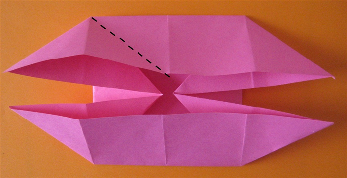 Fold the top left side up at an angle to align its bottom with the center crease