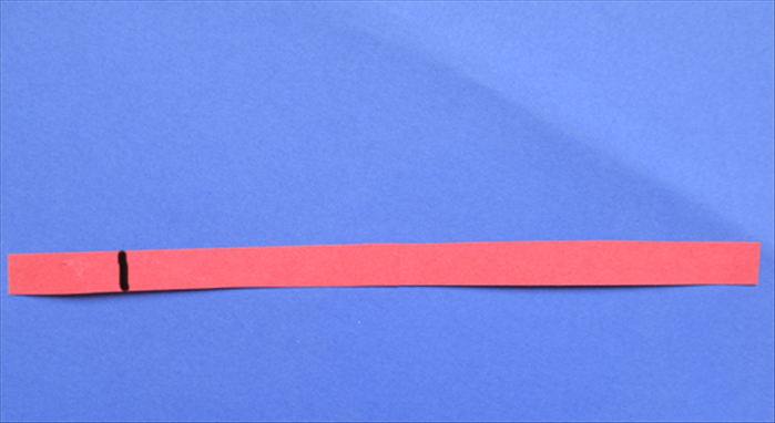 Measure the length of the strip until the mark – for the length that went  around your head.