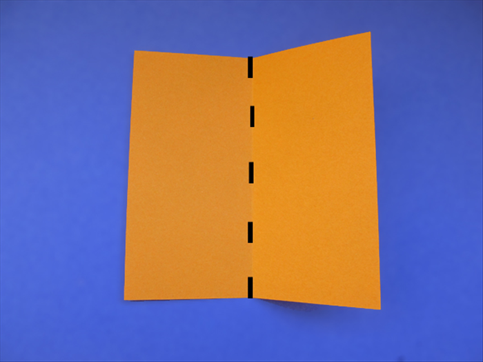 <p> Fold a piece of scrap paper in half.</p>  
<p>  </p>