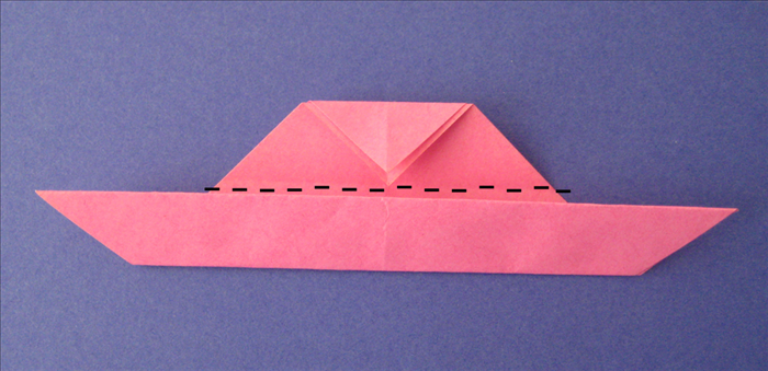 Fold the top down along the edge of the flap