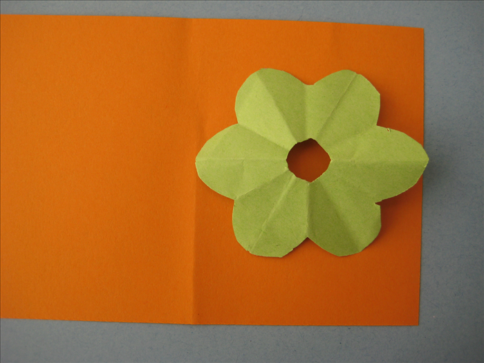 Open the flower
This is your template
Place it at the end of the strip of paper and fold over to mark it’s width
