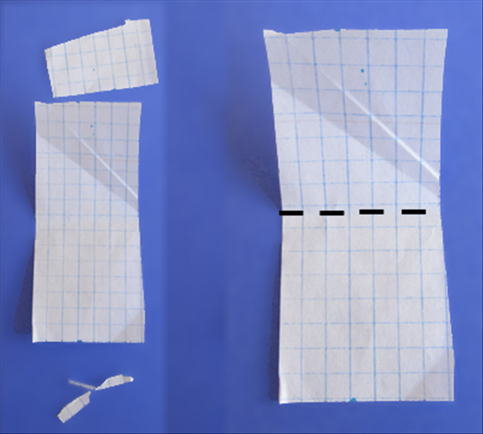 <p> The 2 marks give us the measurement between the holes.</p> 
<p> Cut the paper at the marks.</p> 
<p> Fold the paper in half.</p> 
<p>  </p>
