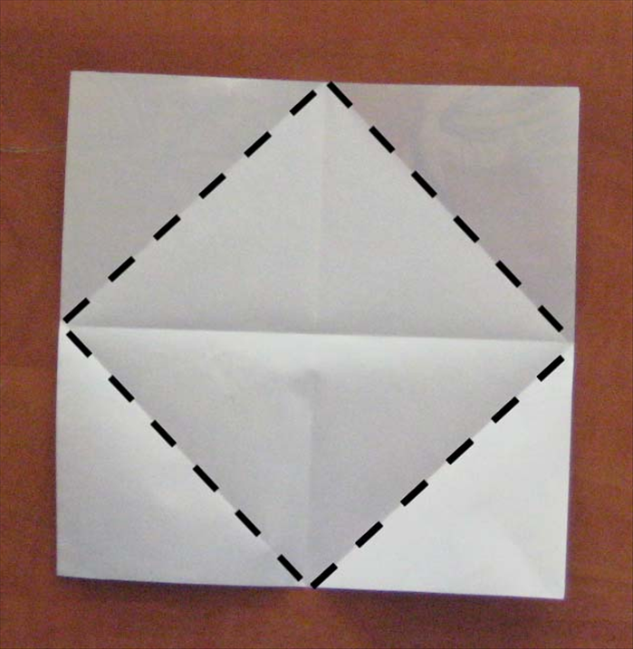 Fold the 4 corner points to the center.