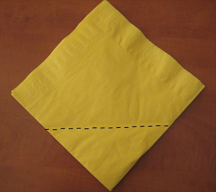 Flip the napkin over to the back side.

Place the napkin with the open side at the top.

Fold the bottom point  up about 3/4 of the way. See next picture.
