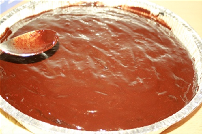 For chocolate lovers:
 Dissolve 2 1/2 ounces of dark chocolate with 3 tablespoons water

 Spread the chocolate on the hot cake. 

It will be difficult to wait, but let it cool before eating