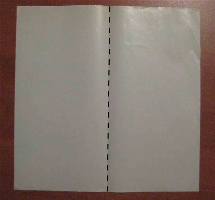Place the side of the paper you want on the outside facing down
 
Fold the paper vertically in half and unfold.