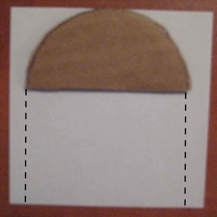 <p> Place the cardboard half circle on a piece of paper, Trace the bottom edge and make a line going down from both sides. The height of those lines will determine the height of your box. Cut out the rectangular shape.</p>