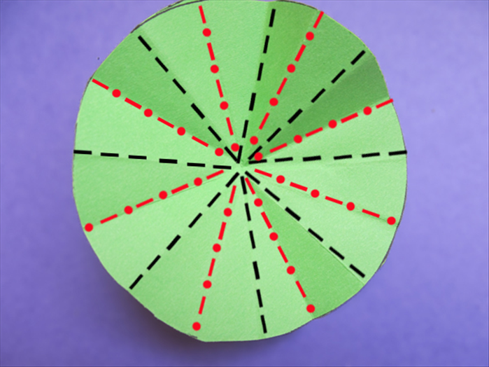 Unfold the circle. There should be 16 crease lines

Fold every other crease line  - shown in black
Fold the lines between them in the opposite direction – shown in red
