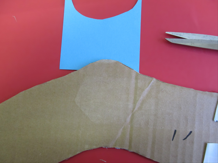 <p> Flip the stocking to the back side and use the edge to cut out the shape.</p> 
<p>  </p>