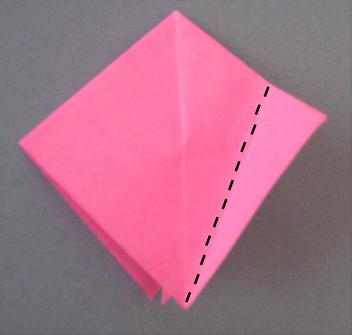 Fold the right edge to the center crease