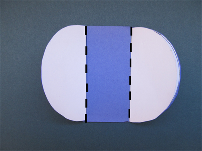 Fold the template along the straight edges of the half circles.