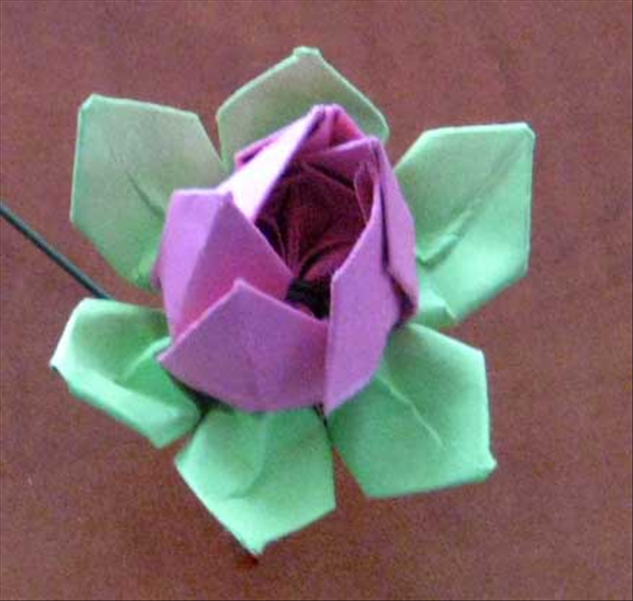 Turn over and squeeze the flower petals together for your finished flower.