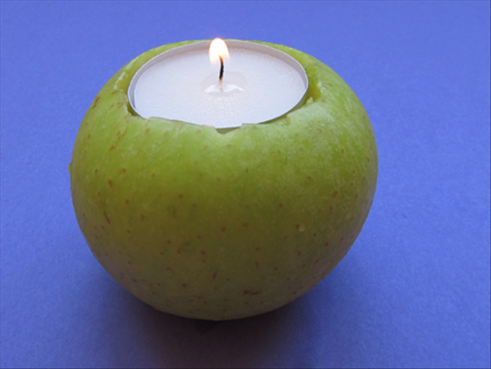 Place the apple candle holders on the table and light them just before your guests arrive.

Happy Holiday!
