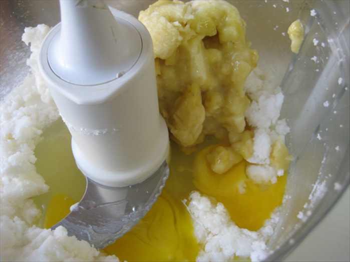 <p> Add the eggs and banana and mix in well</p>