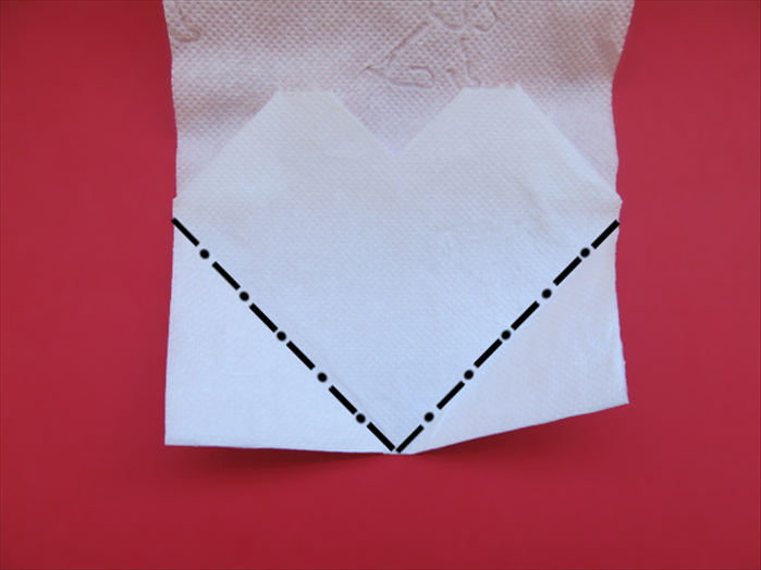 Fold each corner backwards, from the center to the end of the top slant.
*Try to keep them the same.
