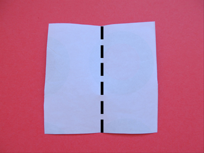 Fold the scrape paper in half vertically