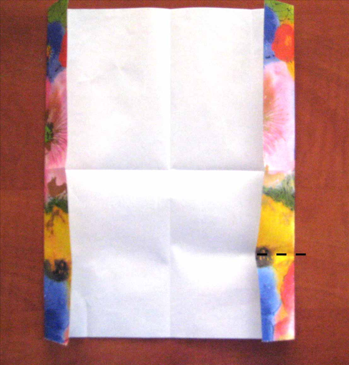 Rotate the paper so that the folded edges are on the sides.
 Repeat steps 4 and 5 on the top and bottom.