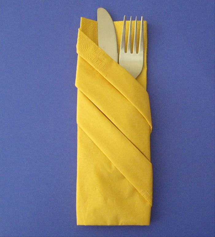 Flip the napkin over for your completed napkin fold
Insert your silverware in the pocket
