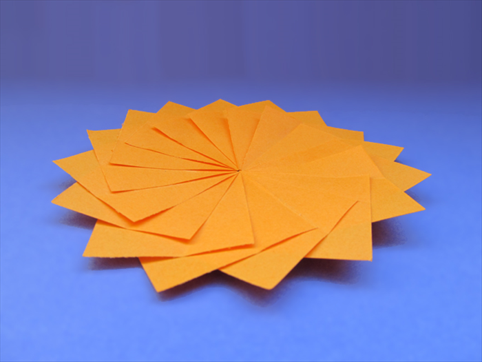 <p> Materials:</p> 
<p> 16 squares of paper</p> 
<p> 1 square of scrap paper the same size</p> 
<p> Paper glue</p> 
<p>  </p>