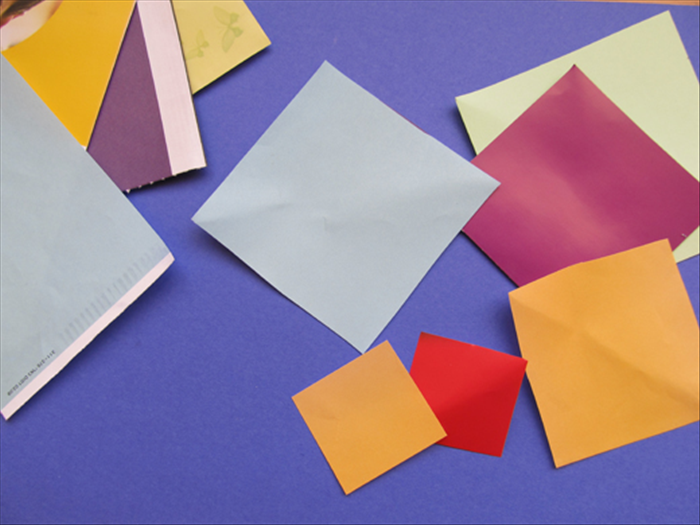 Cut out different sized squares from your junk mail and scrap paper