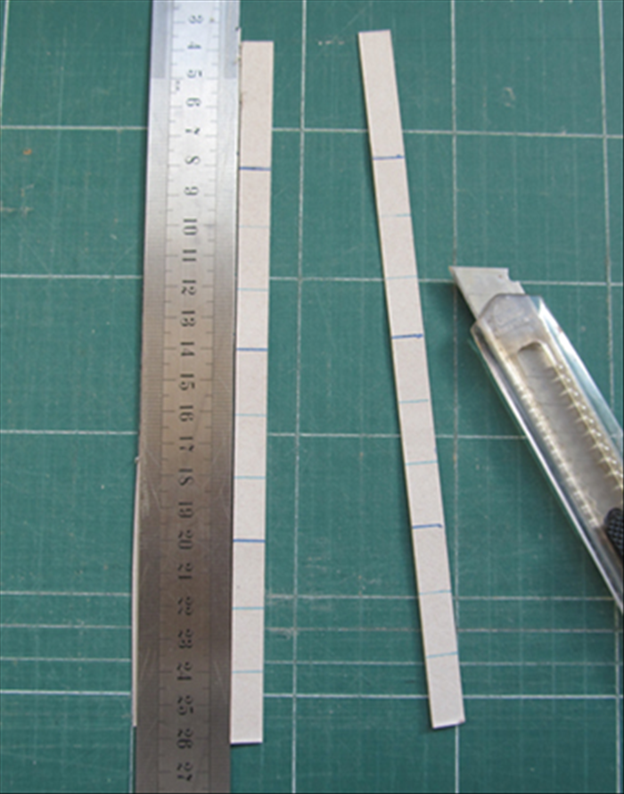 Cut strips the width you want the sides to be. In this case 1 inch.
Leave an extra ½ inch at one end of each strip for gluing it together
