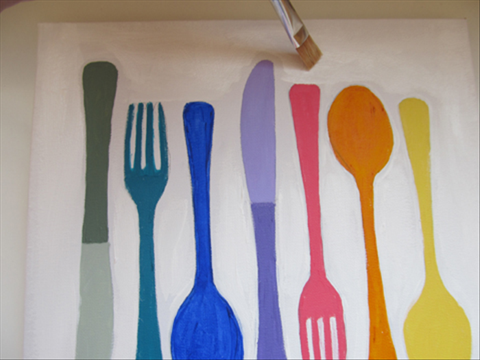 Fill in the background with white paint.
Be very careful when painting between the silverware
If you cover parts of the silverware by accident you can make corrections when the white paint has dried.
