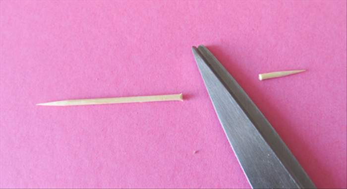 Cut off the tip of a toothpick