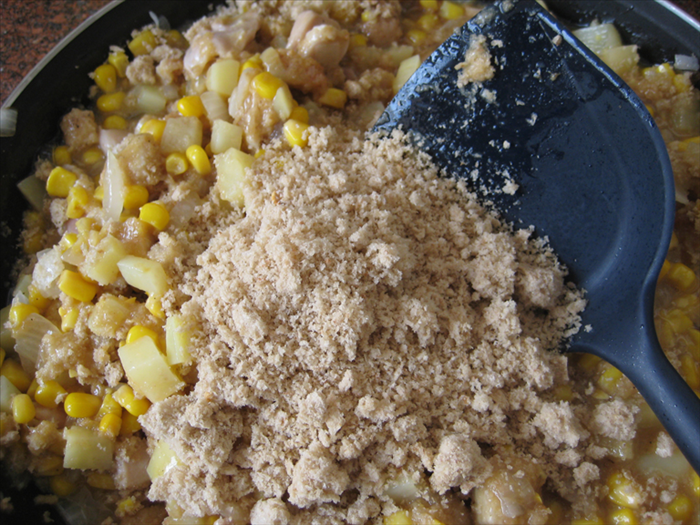<p> Mix in the breadcrumbs</p> 
<p> Add more if it seems too wet</p>