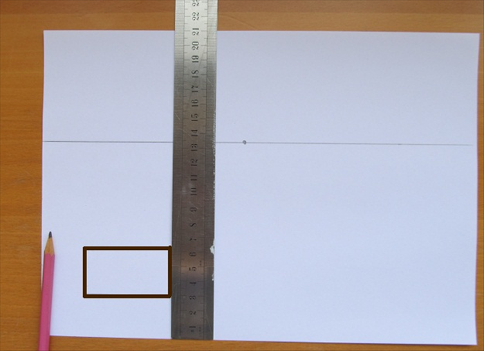 Draw a rectangle on the left lower side of the paper. 