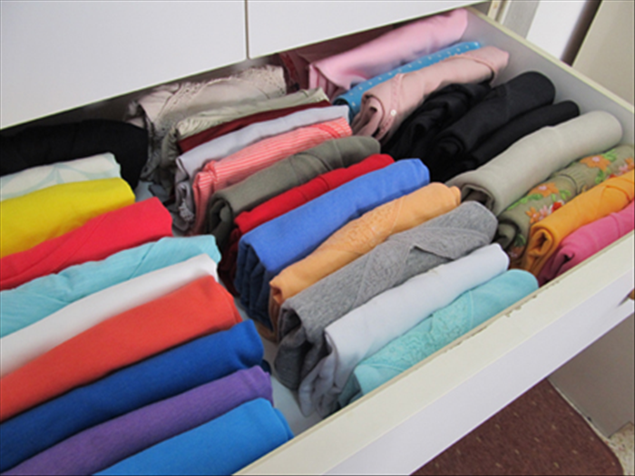 Pull your drawer out all the way. Place them in rows with the folded edge up.
Now you can see them all!

Enjoy
